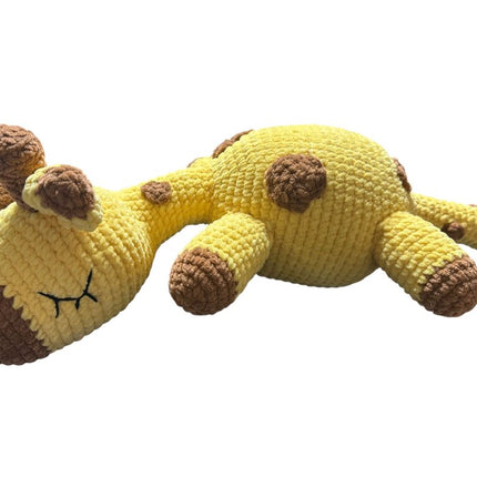 Crocheted sleeping giraffe stuffie