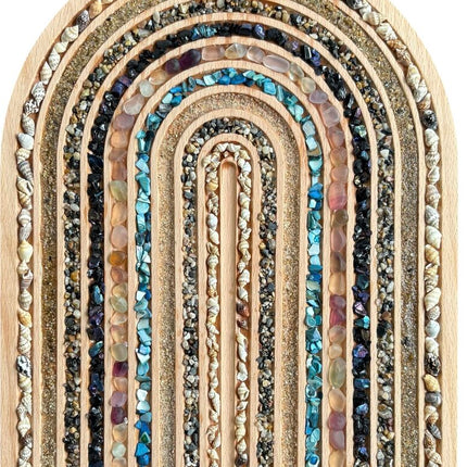 wooden Rainbow filled with beach shells, sand, seaglass