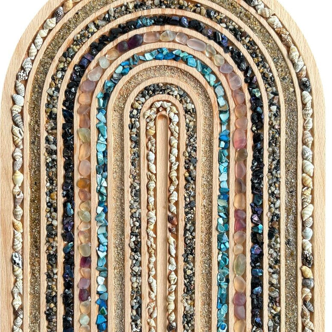 wooden Rainbow filled with beach shells, sand, seaglass