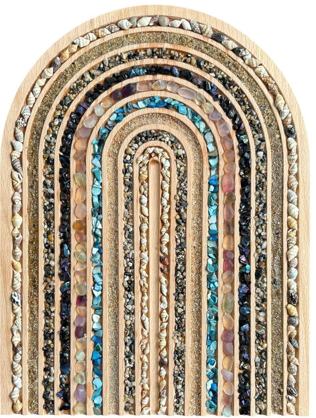 wooden Rainbow filled with beach shells, sand, seaglass