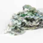 icy blues, deep greens, and soft grays with a shiver of winter magic