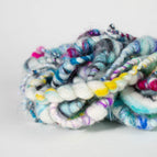 icy blues, deep greens, and soft grays with a shiver of winter magic