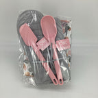 white paper with pink and gray polka dots