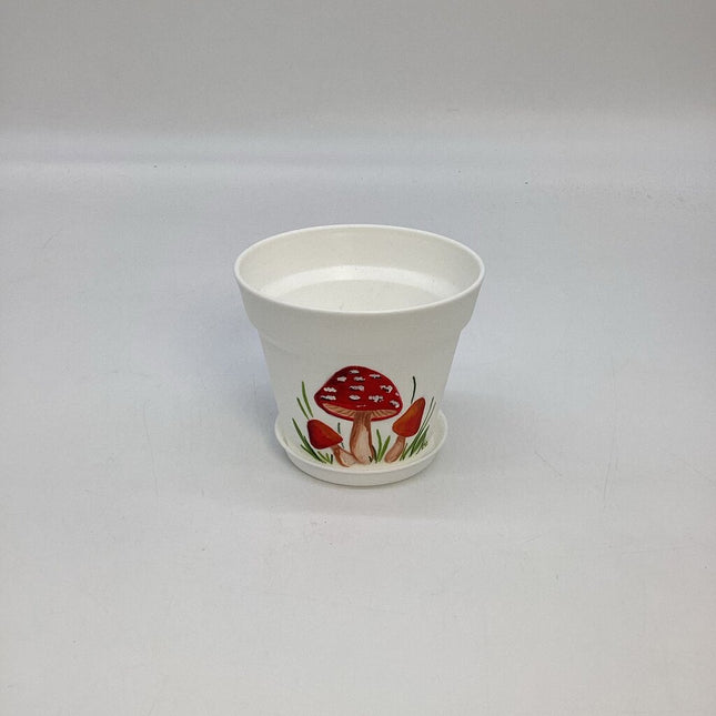 Small white w/red mushrooms-E