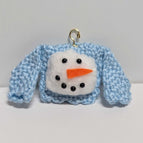 Light blue with a cotton ball snowman face