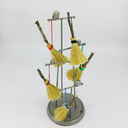 Broom Ornament, rosy brown