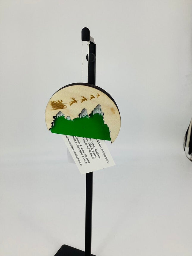 Ornament sleigh over the trees