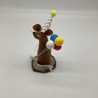 brown mouse with balloons