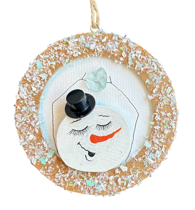 ornament, snowman holding clear ice, closed eyes