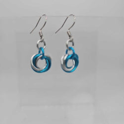 Turquoise and Silver small single mobius earrings - view 1