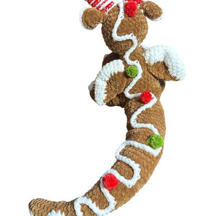 Crocheted gingerbread dragon plushie