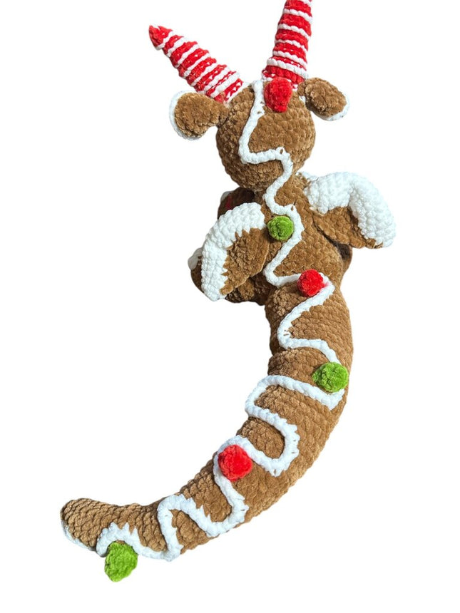 Crocheted gingerbread dragon plushie