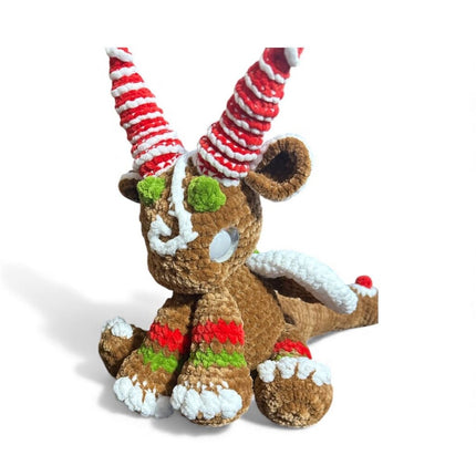 Crocheted gingerbread dragon plushie