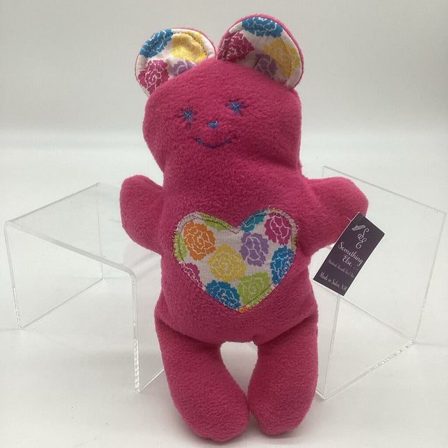 Teddy bear pink w/multi color flowers