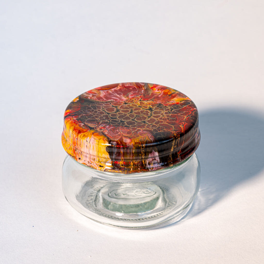 4 oz Jar Cover is gold, red burgundy, black