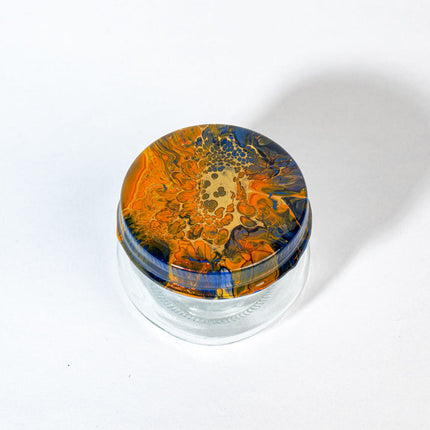 4 oz Herb Jar Cover is orange gold black blue