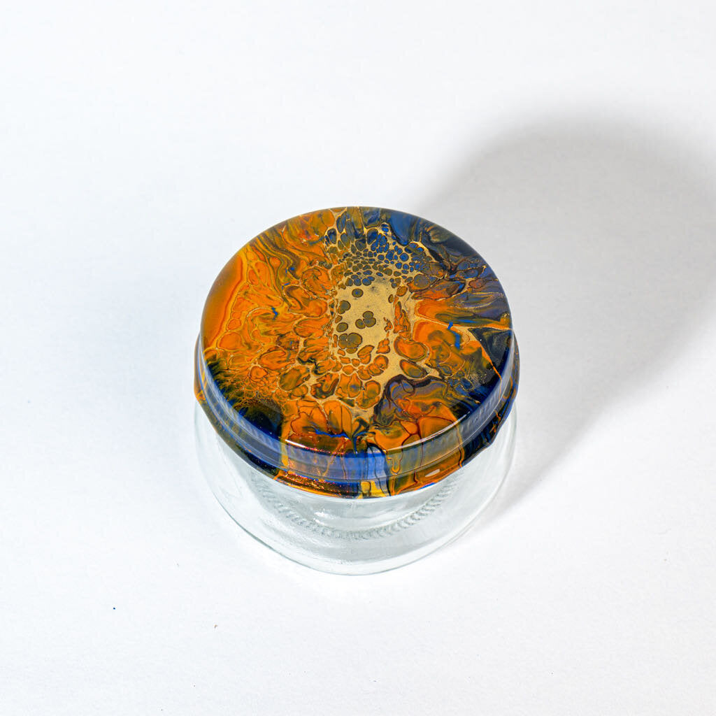 4 oz Jar Cover is orange gold black blue