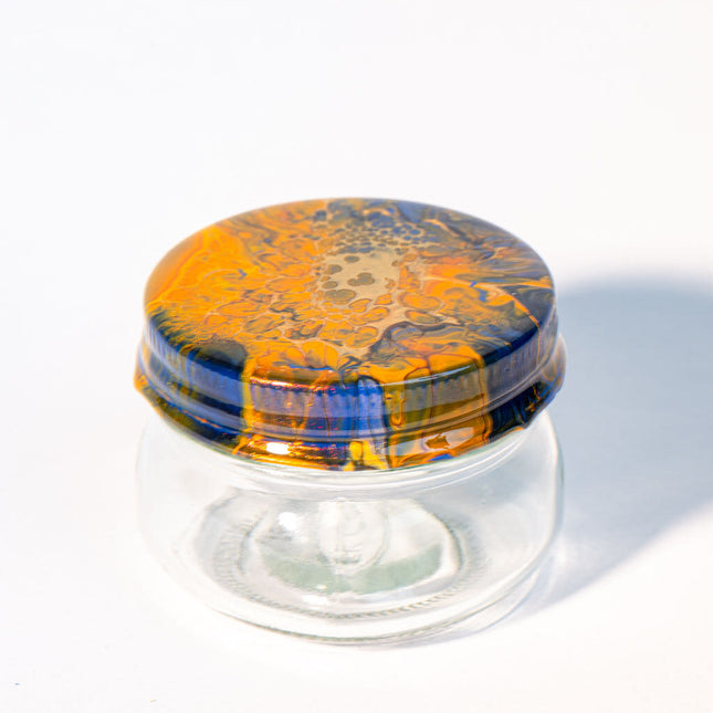 4 oz Herb Jar Cover is orange gold black blue