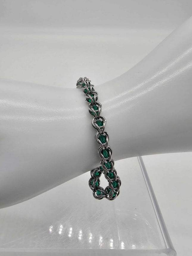 Stainless Steel Captured Bracelet with Green Crystal Beads 7.5 inches