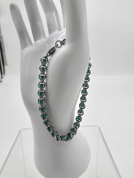 Stainless Steel Captured Bracelet with Green Crystal Beads 7.5 inches