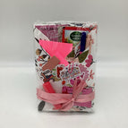 white paper with pink flowers