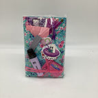 Teal paper with pink and purple flowers