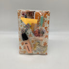 Orange flowered paper