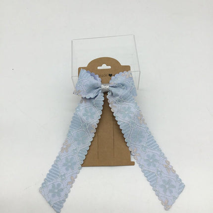 Light blue, lace like bow