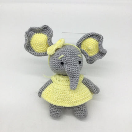 Gray/yellow mama elephant