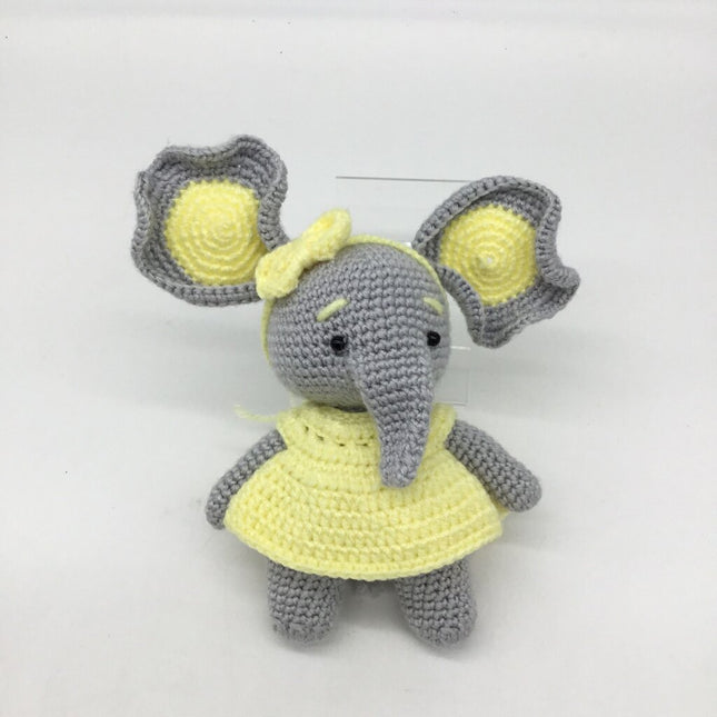 Gray/yellow mama elephant