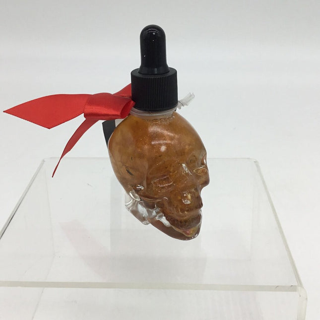 Chameleon shimmer body oil with flowers