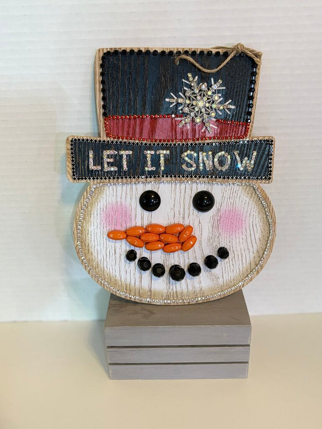 WOOD PAINTED SNOWMAN FACE accentedw/ jewelry and hangs