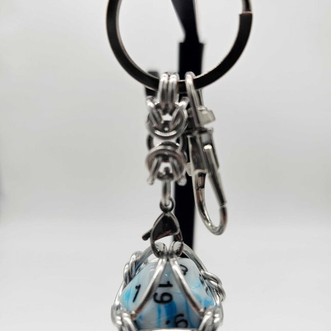 Caged D20 Keychain - Dark Blue White Marble D20, Silver Byzantine