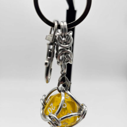 Caged D20 Keychain - Translucent Yellow D20, Silver Byzantine