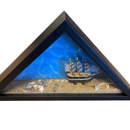 triangle beach scene. with shells and ship