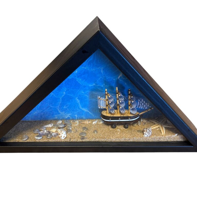 triangle beach scene. with shells and ship