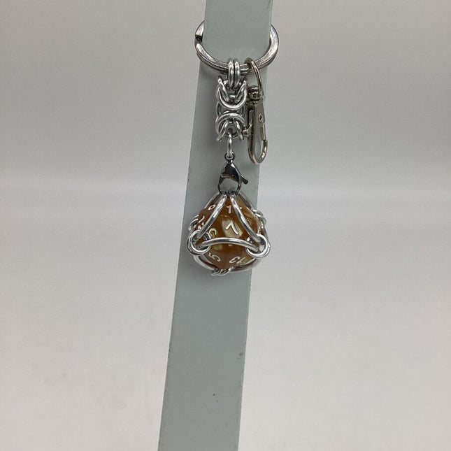 Caged D20 Keychain - Dark Yellow Marble D20, Silver Byzantine