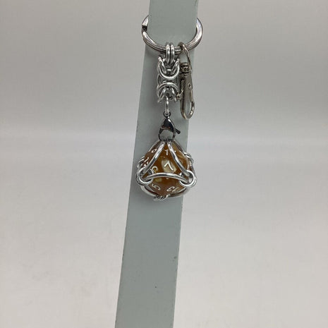 Caged D20 Keychain - Dark Yellow Marble D20, Silver Byzantine