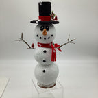 white snowman with black hat and red scarf