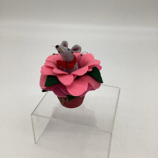 tiny mouse in flower vase
