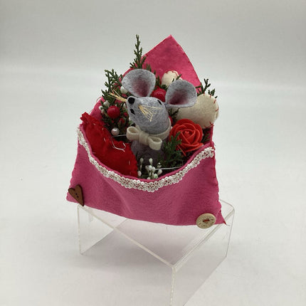 Gray mouse in pink envelope