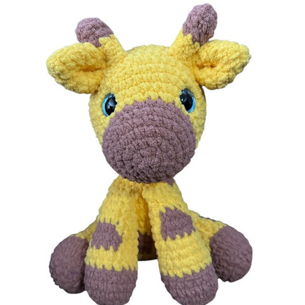 Crocheted sitting giraffe plushie