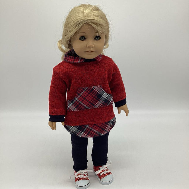 Red tunic with leggings and sneakers