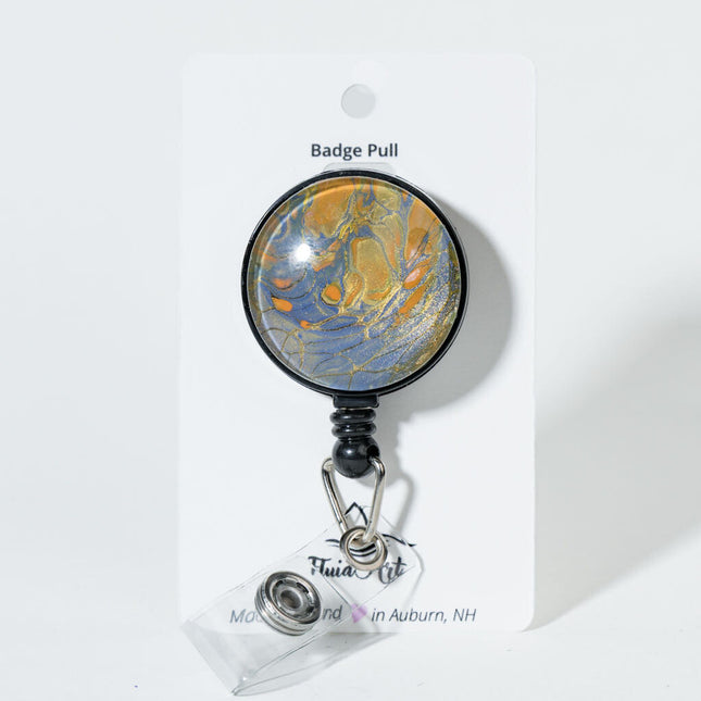 1.25" Fluid Art Badge Reel - iridescent, gold, orange dark lavender background