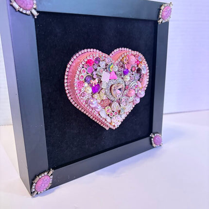 3in wood heart painted pink & decorated w/vtg jewelry pieces 8 in black frame