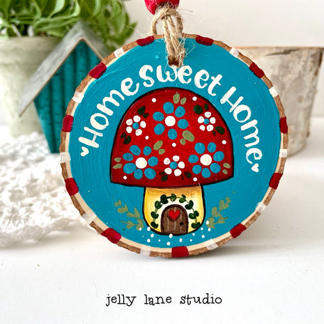 MUSHROOM HOME WOODSLICE ORNAMENT