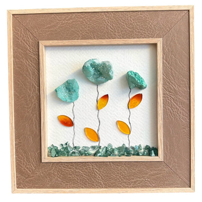 green agate rocks in leather frame with quote