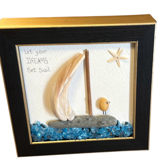 shell sailboat with bird on boat