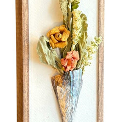 flowers in a pen shell - view 1