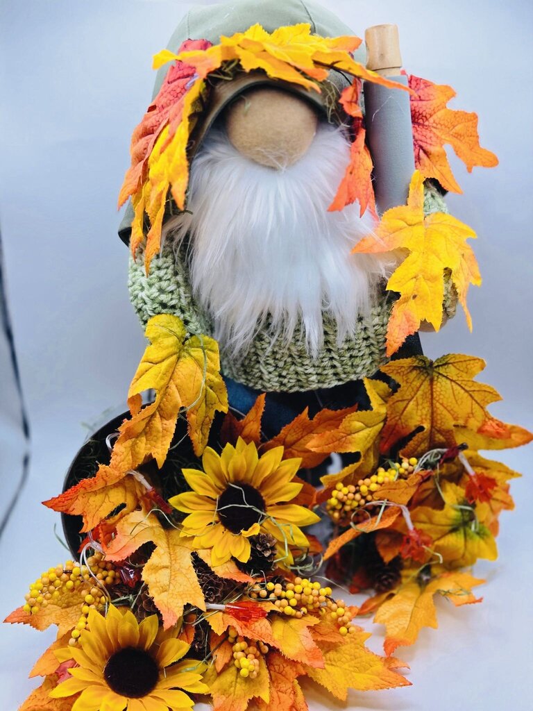Big Gnome Raking Fall leaves